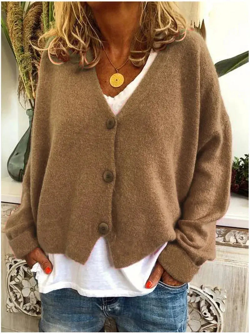Homixa women's v-neck button-front knit cardigan with long sleeves in solid colors, draped on a mannequin.