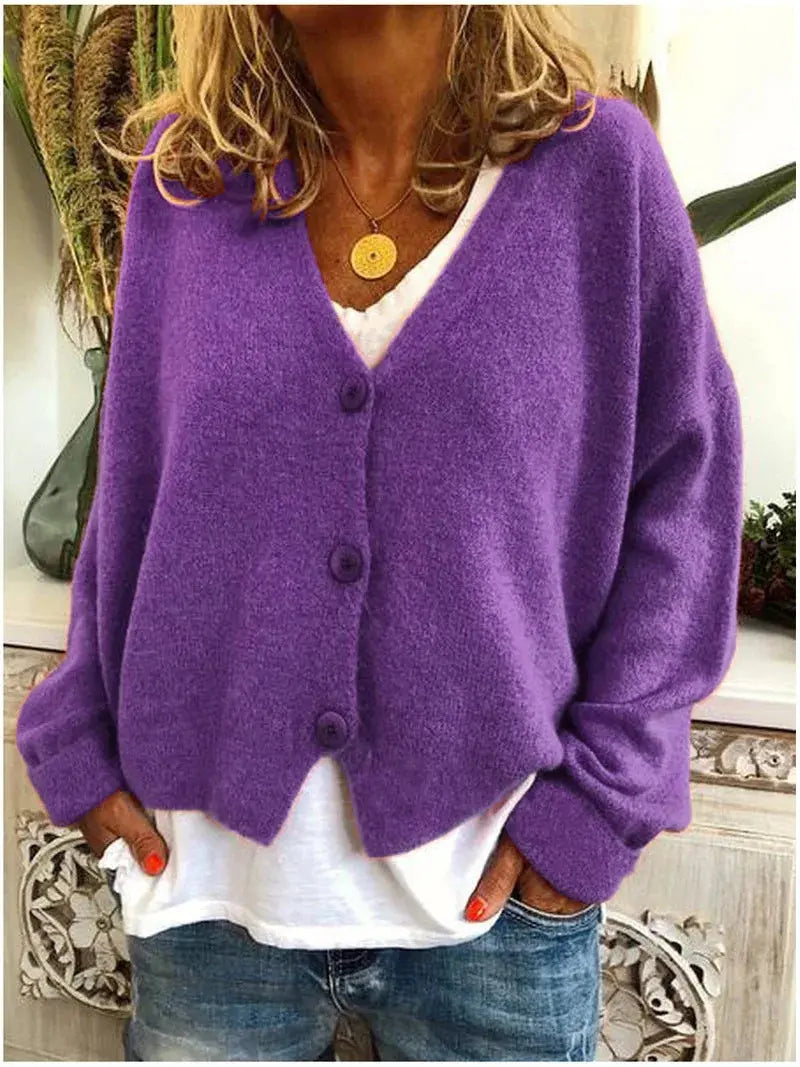 Women's V-neck button-front knit cardigan by Homixa featuring long sleeves and solid color options, displayed on a model.