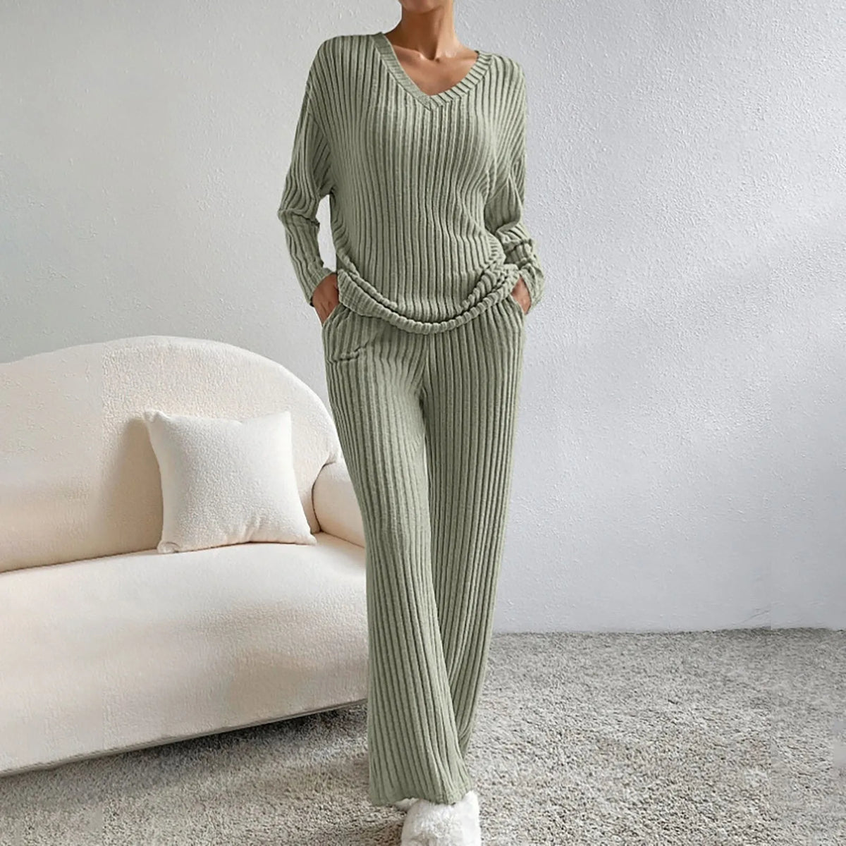 Homixa women's V-neck knit two-piece set with long-sleeve top and elastic-waist pants, displayed on a model against a white background.