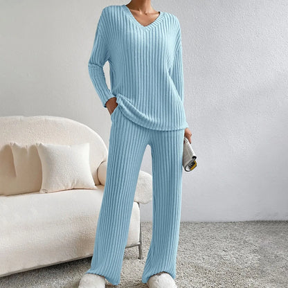Women's V-neck knit two-piece set by Homixa featuring a long-sleeve top and elastic-waist pants, shown in a cozy, stylish fit.