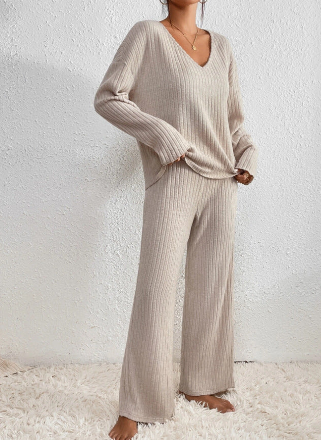 Homixa women's V-neck knit two-piece set with long-sleeve top and elastic-waist pants, shown on a model.