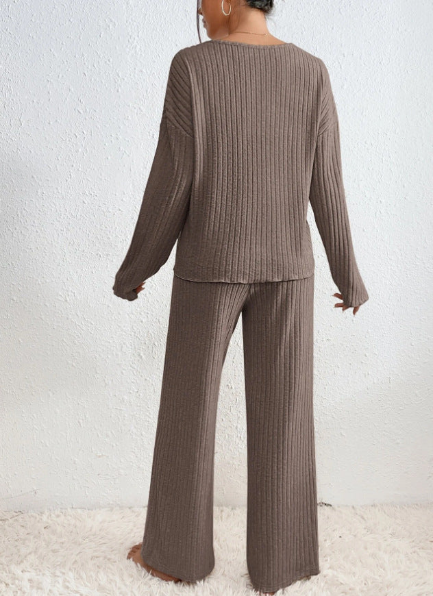 Homixa women's V-neck knit two-piece set with long-sleeve top and elastic-waist pants, displayed on a model.