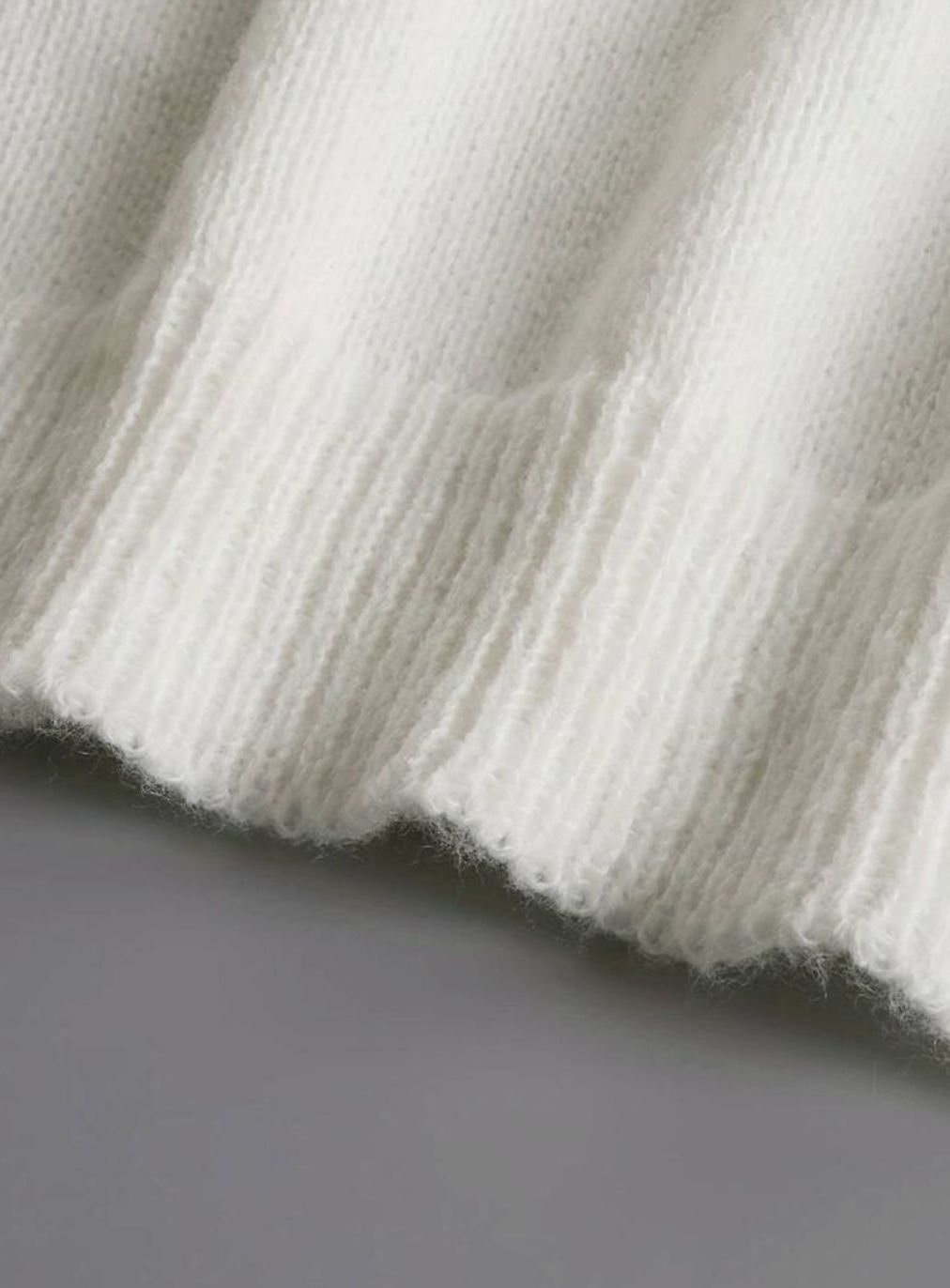 Homixa women's V-neck sweater featuring pearl buttons, ruffle trim at the neckline and cuffs, soft knit cardigan or button-front sweater.