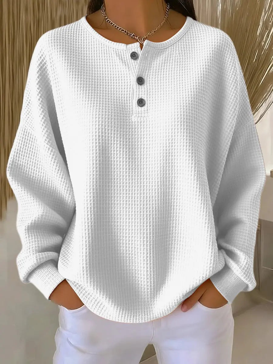 Women's waffle-knit Henley pullover by Homixa with long sleeves and three-button placket, cozy and casual for everyday wear.