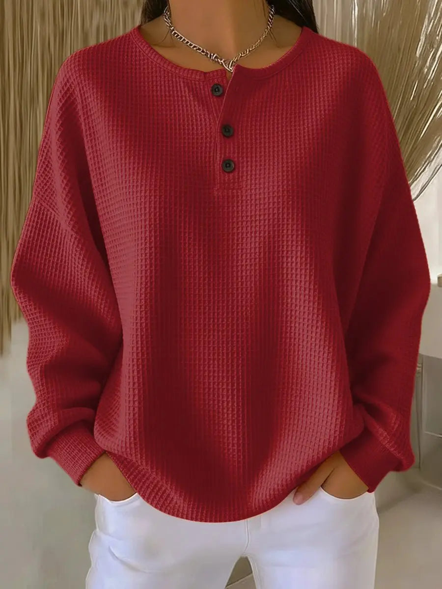 Women's waffle-knit Henley pullover with long sleeves and three-button placket, made by Homixa.