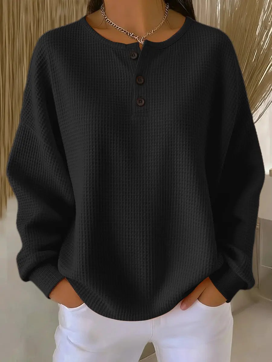 Women's waffle-knit Henley pullover by Homixa with long sleeves and a three-button placket, casual and cozy knit sweater.
