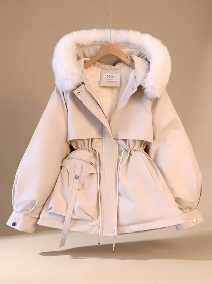 Women's water-resistant fitted winter parka by Homixa with faux-fur hood and drawstring waist, perfect for cold weather.