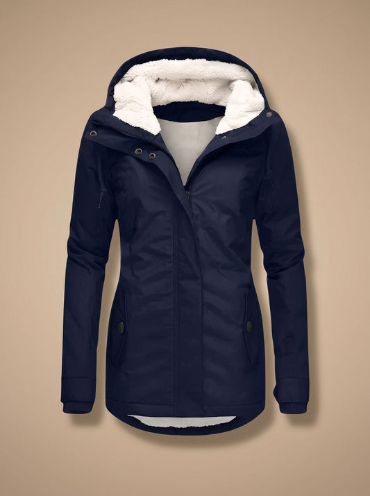 Women’s waterproof winter jacket by Homixa with fleece lining, hood, and full-zip front, suitable for cold weather.