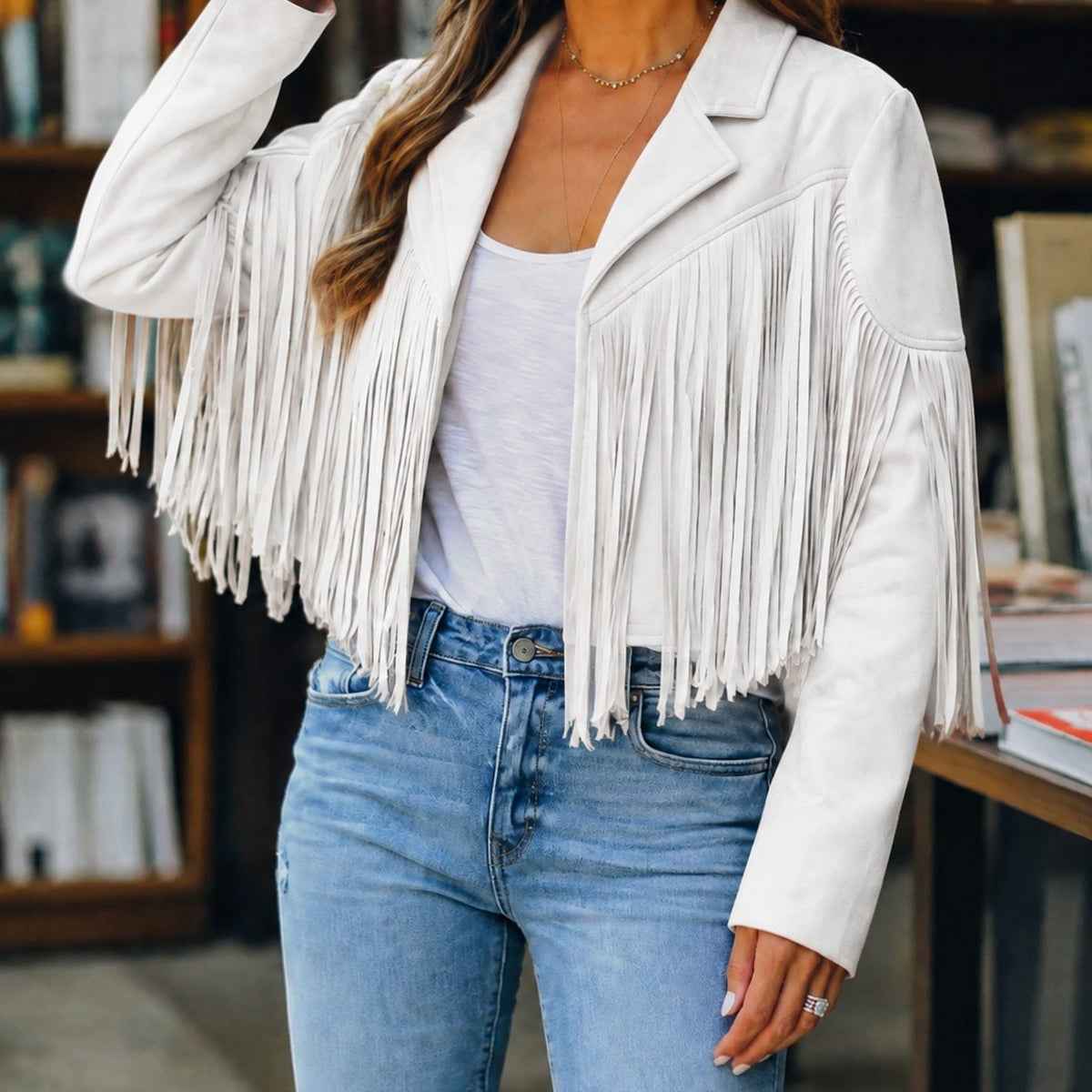 Women’s Western Fringe Jacket by Homixa featuring cropped faux suede, notched lapels, and fringe details for a stylish western look.