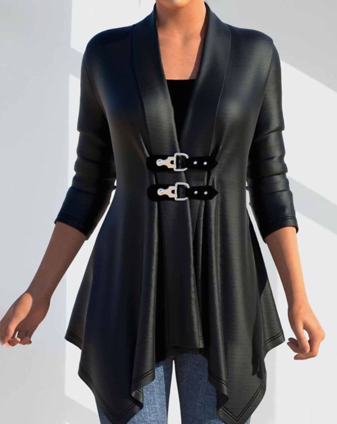 Women’s faux leather winter jacket by Homixa featuring an asymmetric hem and double buckle details, shown in a stylish outdoor setting.