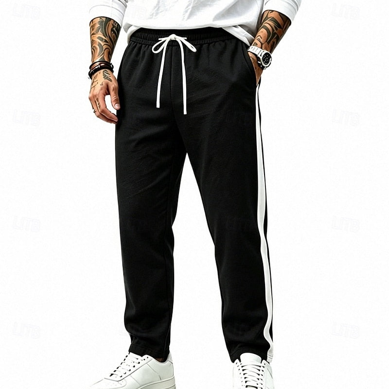 Harper & Wells Damian relaxed side-stripe sweatpants in dark gray, featuring comfortable fit and stylish side stripe detail.