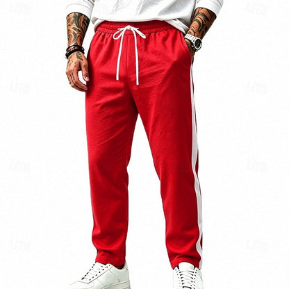 Harper & Wells Damian relaxed side-stripe sweatpants in soft fabric, featuring comfortable fit and stylish side stripe detail.